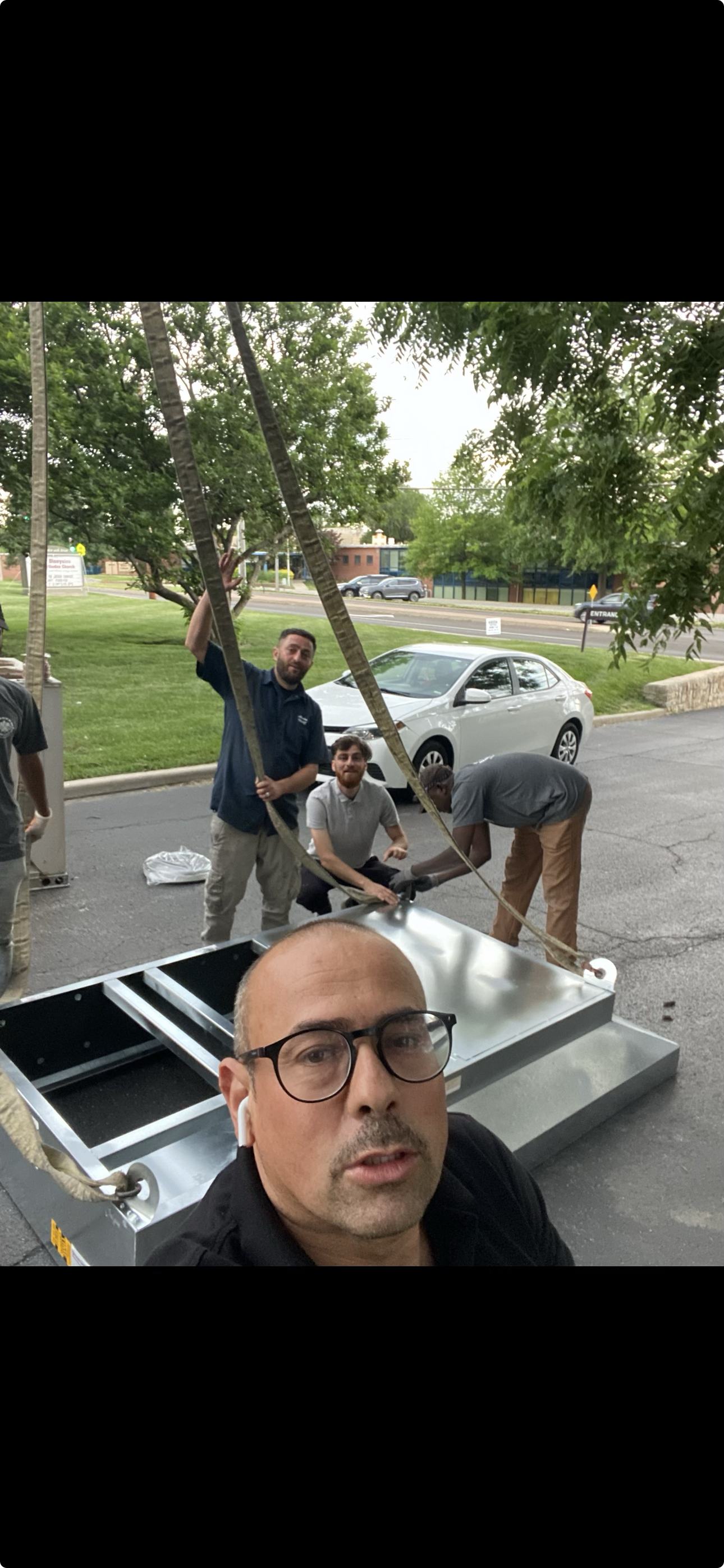 Albater team rigging equipment for a commercial install.